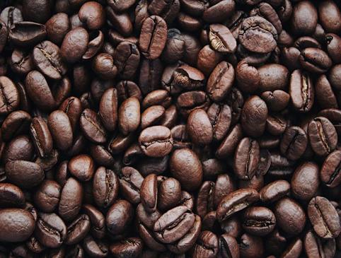 close-up of roasted coffee beans - nutrition and performance benefits for athletes
